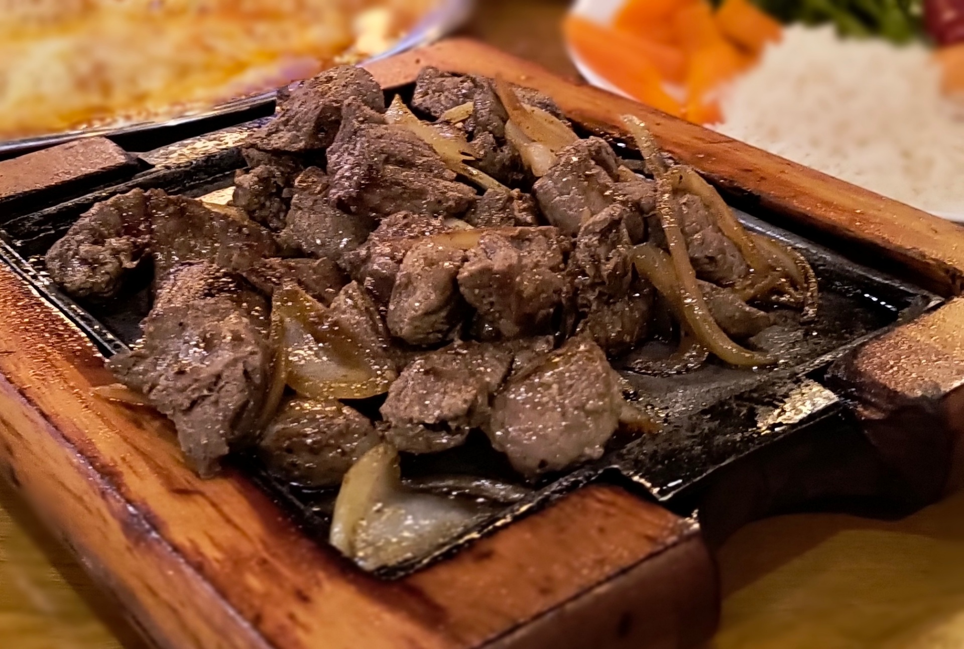 Porção de carne na chapa